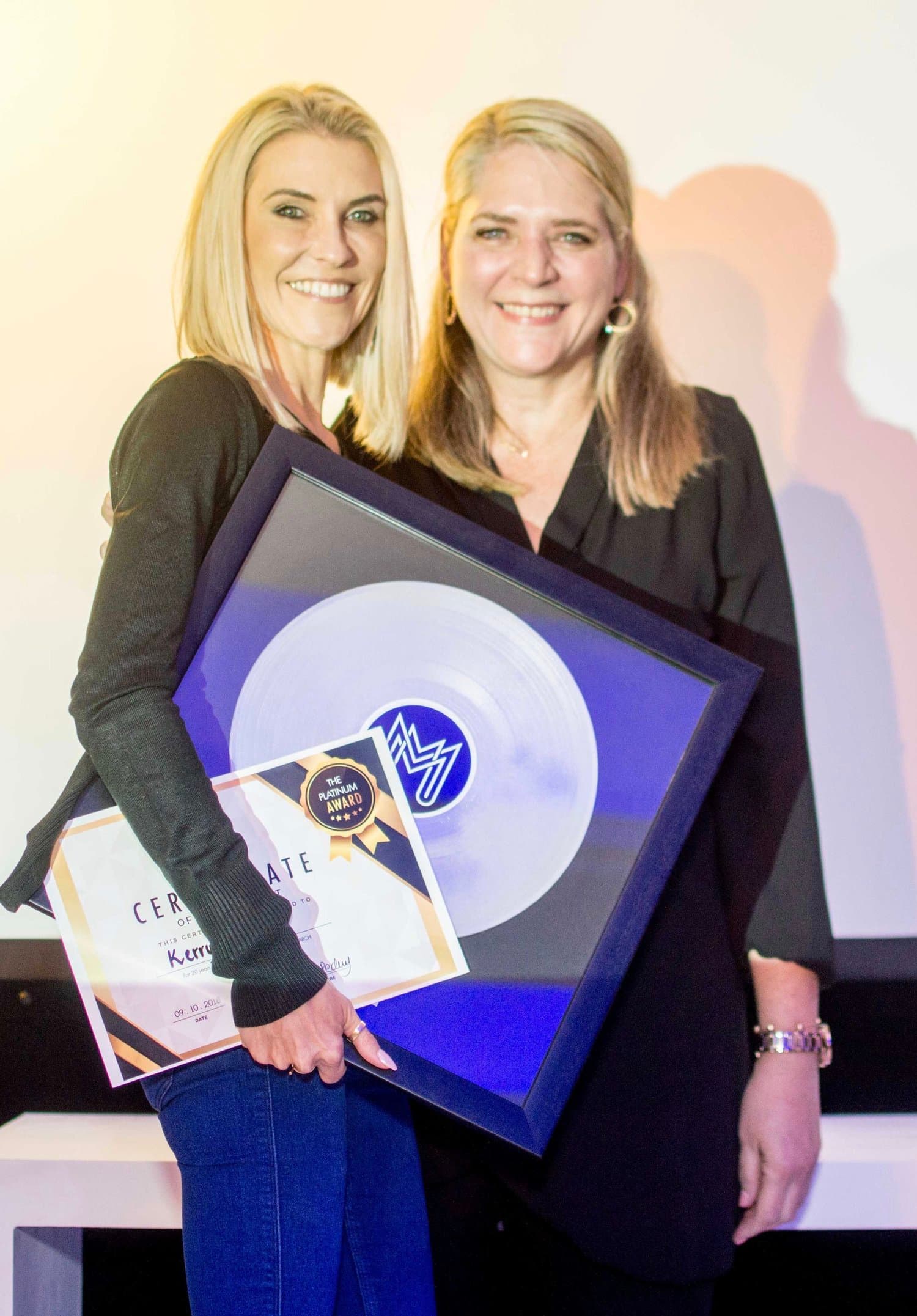 A special recognition piece created to honour Kerry Dranias’s 20 years of service.